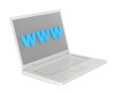 笔记本电脑和WWW的话在屏幕上孤立在白色的背景