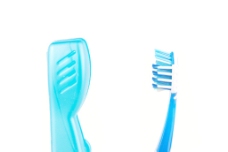 蓝色和白色的牙刷和案例